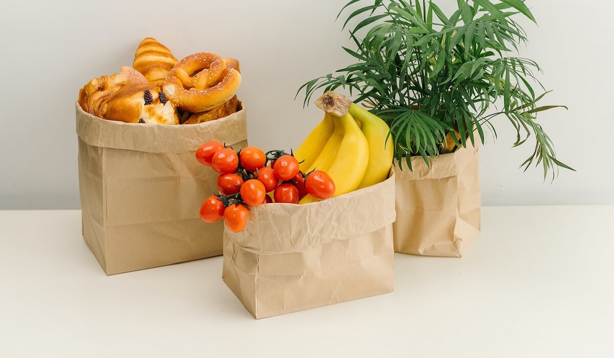 Products and flower in brown bags
