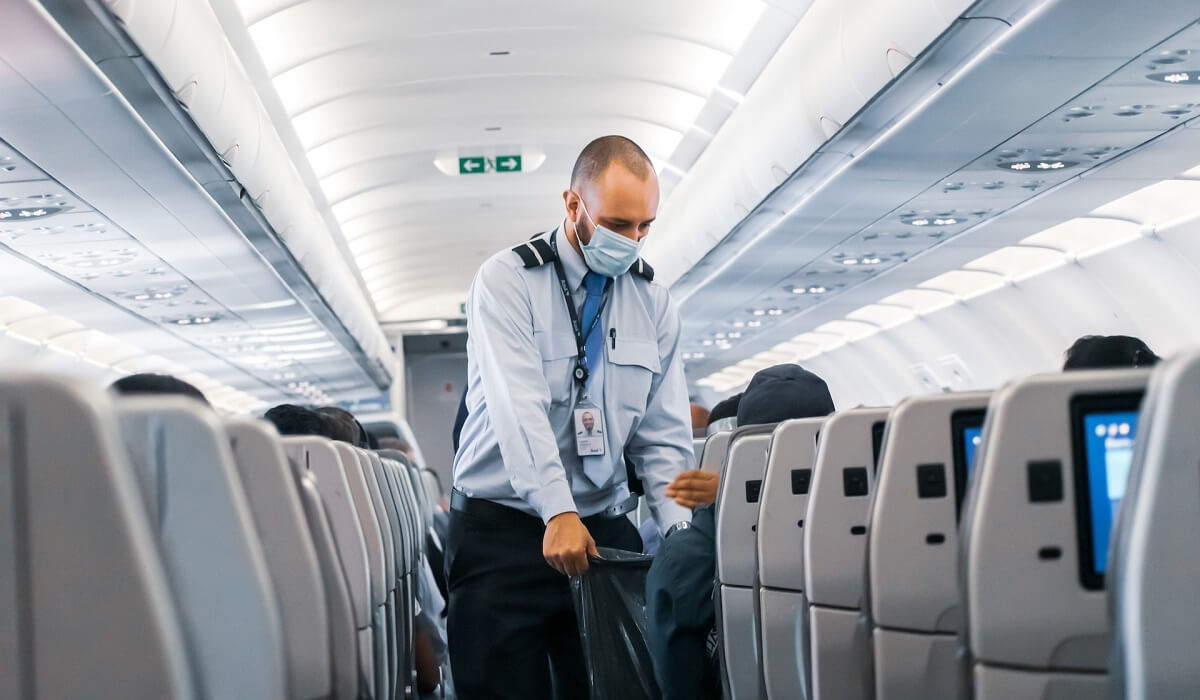 Flight attendant in airplane