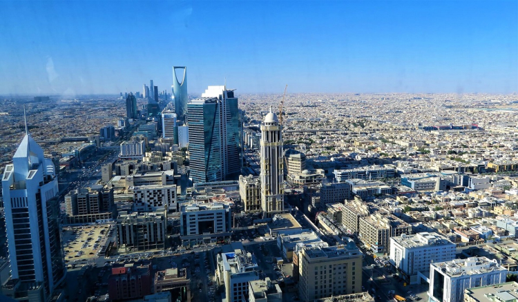 A view of a city Riyadh from the top of a building